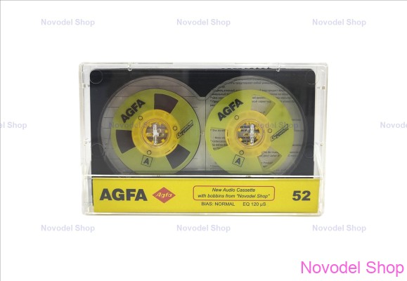 Аудиокассета "AGFA" c жёлтыми боббинками в черно-прозрачном корпусе